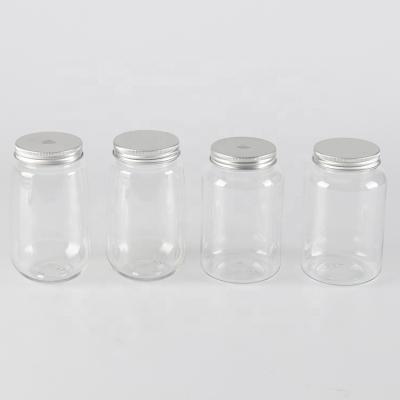 China Storage Jars Customized Clear Plastic Packaging PET Beverage Bottle With Hole Lids For Soft Drink for sale