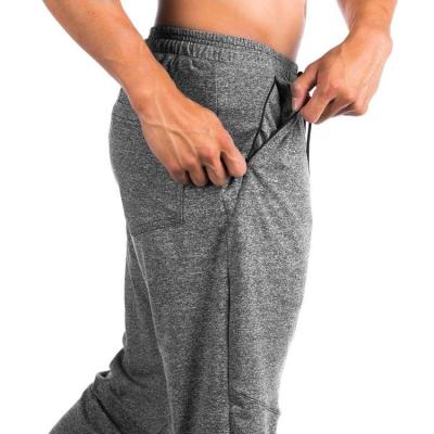 China Breathable Gym Sweat Wicking And Breathable Mens Sports Training Jogging Pants With Zipper Pocket for sale