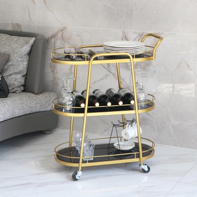 China Home Modern Luxury KD Metal Food Hotel Coffee Lounge Cart Mobile Glass Drinks Bar Cart Serving Cart Gold Trolley for sale