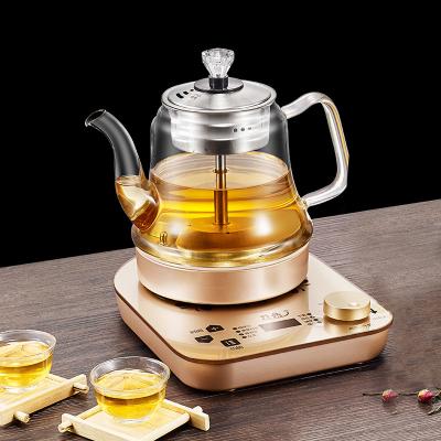 China Widely Used Health 360 Degree Low Pot Rotation Glass Electric Kettle Automatic Tea Maker for sale