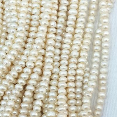 China Wholesale Freshwater Pearl 5-6mm Bread Shape Freshwater Pearl Cultured Loose Button Pearl Strands for sale