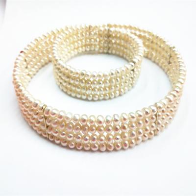 China Freshwater Pearl Natural White 4 Layer Freshwater Pearl Necklace AAA Pearl Jewelry Necklace Bracelet Set for sale