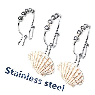 China 2022 Eco-friendly Decorative Stainless Steel Conch Fish Resin Shower Curtain Hooks With Roll Ball For Bathroom Curtain for sale