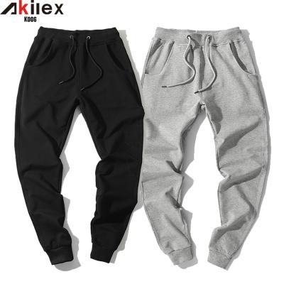 China Pants Akilex Ready To Ship Autumn Winter Wear Knitted Hoodie Pants Wholesale Good Quality Running Sports Pants for sale