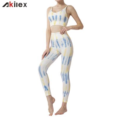 China Akilex Anti-Static Wholesale Women Two Piece Tie Up Dye Fitness Gym Yoga Set Seamless Running Bra And Leggings for sale