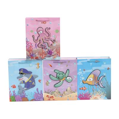 China Cute White Cardboard Gift Octopus Shark Bag Recycled Paper Materials Sea Animals Shopping Bag For Kids Clothing Shoes Custom Logo Paper Bag for sale