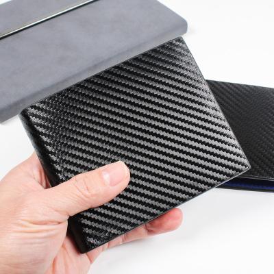 China Wholesale-zero simple stain casual men's wallet technology sense ultra-thin clip carbon fiber men's ticket ultra-thin seamless youth wallet for sale