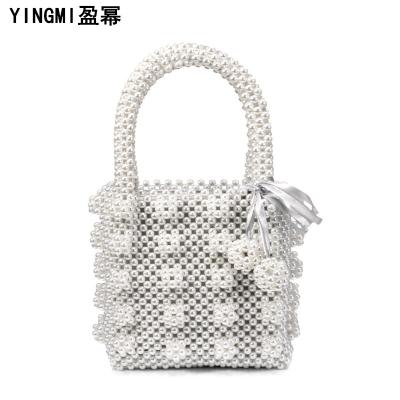 China Lady's Luxury Popular INS Pearl Handbag Net Red Niche Pack Beaded Bag Fashionable Pearl Bag for sale