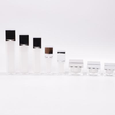 China New Design Cosmetic Square Acrylic Lotion Pump Bottle Set For Cosmetic Packaging for sale