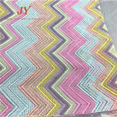 China DIMENSIONAL embroidery national classic color style geometric pattern lace fabric for sale