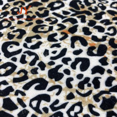 China Wholesale Special Anti Pill Pattern Velvet Animal Fabric For Clothing Cloth Tissue Velvet Leopard Print Fabric for sale