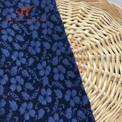 China Wholesale Dark Blue Stretch Flower Pattern Polyester Spandex Embossed Velvet Fabric for sale