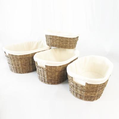 China Sustainable Renel One Set 4 Sizes PE Rattan Woven Storage Basket Home Rattan Set Organizing Baskets for sale