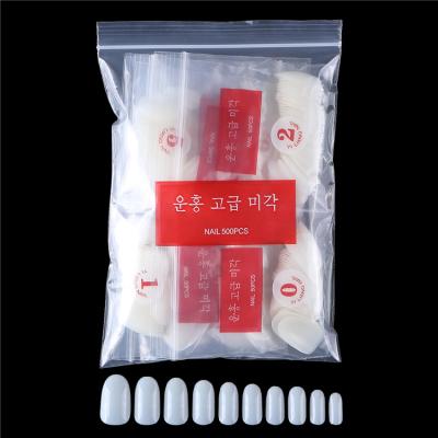 China Hot Sale 500pcs/bag DIY Nail Art ABS Full Cover Short Oval False Nails Artificial Nail Tips for sale