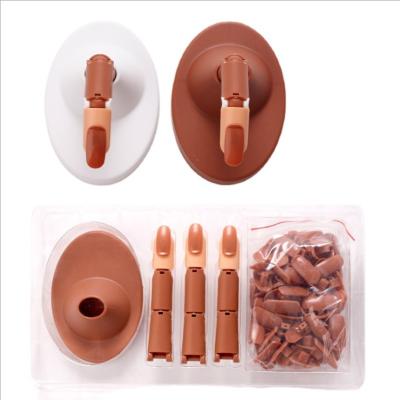 China Nail Practice 2021 New OEM Nail Art Training Practice Brown Finger Nail Tips with Nail Holder and 100pcs Tips Wholesale Supplier for sale