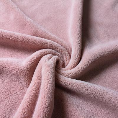 China High quality 100 polyester solid coral minky fleece fabric Shrink-resistant for sale