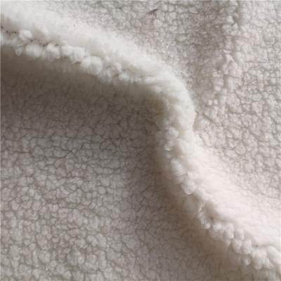 China New Polyester Fleece Fabric Shrink-Resistant Solid Single Side Long Pile Shimmer Mature Fabric for sale