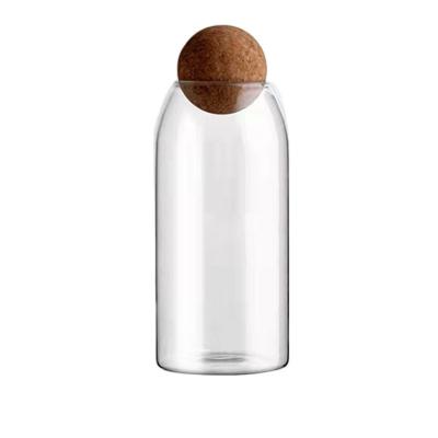 China Borosilicate Sustainable Clear Glass Spice Storage Jar With Cork Ball Lid for sale