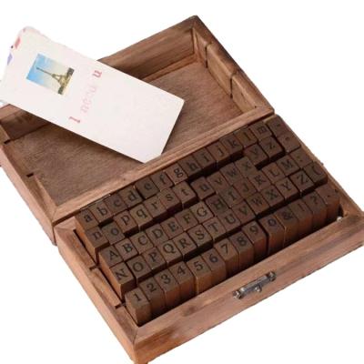 China Children's toy 26 letter stamps + 4 trademark stamps + number DIY set universal letter decoration storage box with the verdict for sale