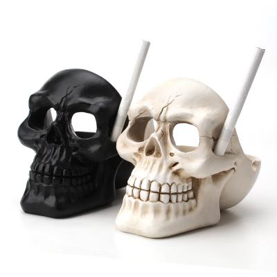 China Customized Skull Shaped Resin Ashtray 140*90*110mm Black White for sale