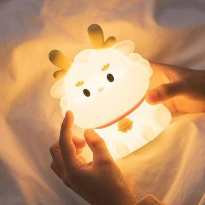 China Smart Voice Light Dragon Charge With Sleeping Silicone Pat Creative  Night Light Gift Colorful Atmosphere Light for sale