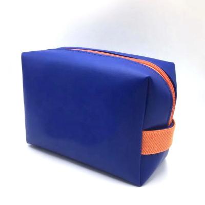 China Customized Blue Portable Makeup Brush Cosmetic Bag Custom Fashion Travel PU Cosmetics Makeup Storage Simple Waterproof Bag for sale