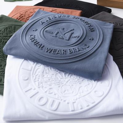 China Anti-Wrinkle Embossed Logo T-Shirts Printing Custom Cotton Round Neck T-Shirts 3D Unisex Embossed T-Shirt for sale