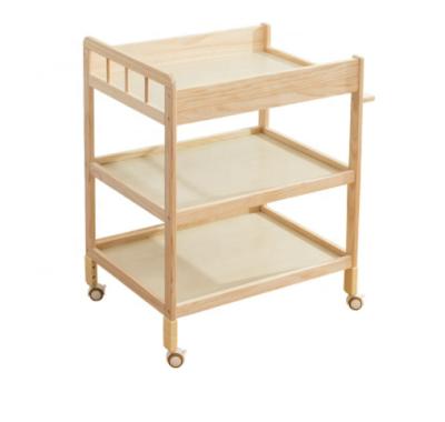 China Baby Diaper Table Baby Changing Solid Wood Save Protect Diaper Table With Wheels for sale