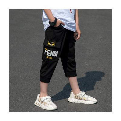 China Elastic force movement leisure pants shorts ice anti-pilling Capris thin style easy silk Korean style boys work clothes trousers boys for sale