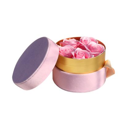 China Recyclable Luxury Pink Cardboard Wedding Keepsake Round Valentine Gift Box With Golden Ribbon for sale