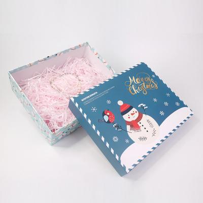 China Custom Logo Snowman Packaging Rectangle Paper Recyclable Christmas Elk Cardboard Gift Box for sale