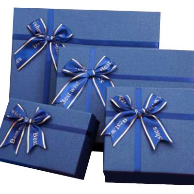 China Handmade hot sale valentines rectangle cardboard wedding keepsake deep blue gift box with ribbon for sale