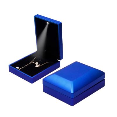 China Leather In Stock Plastic Blue Leather Jewelry Box Led Pendant Storage Luxury Gift Box For Girls for sale