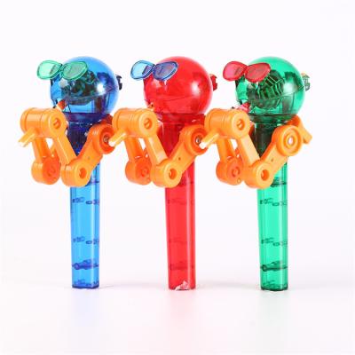 China Plastic & Hot Candy Lollipop Candy Stand Robots Plastic Easter Candy Toys For Wholesale for sale