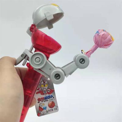 China Plastic & 2022 Newest Creative Candy Toy Gift Dustproof Candy Personality Lollipop Toys Holder Decompression Robot Candy for sale