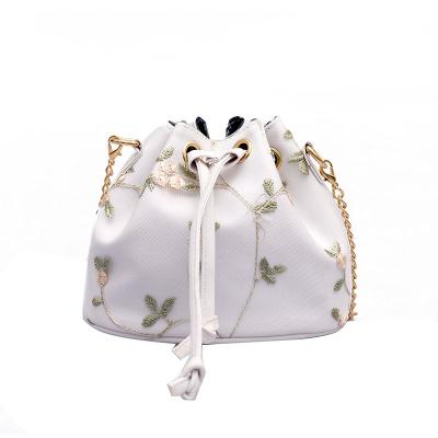 China 2021 new high quality lace flower bucket bag portable fashion mini shoulder bag fresh embroidered chain handbag cross - body bag for sale