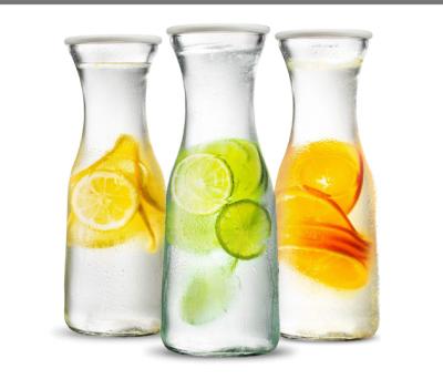 China WITH LID high quality and large capacity glass bottle 3 pieces set with plastic lid for water juice for sale