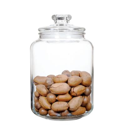 China Sustainable Food Storage Glass Jar With Glass Lids Round Storage Cookie Candy Glass Food Jars Mason Jars With Lids Bulk for sale