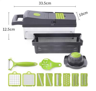 China Sustainable Multifunctional Amazon Kitchen Tools 8 Blades Handheld Variety Fruit and Vegetable Slicer Machine with Grater Drain Basket for sale