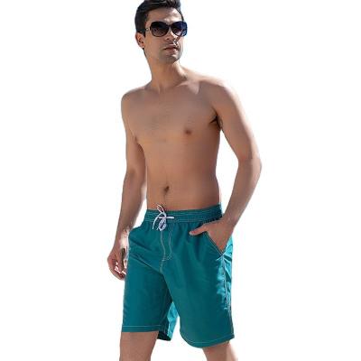 China Mensen Snelle Droog Geweven Strandbroek Vaste Kleur Vijf Minuten Shorts Surf Zwem Vakantie Te koop