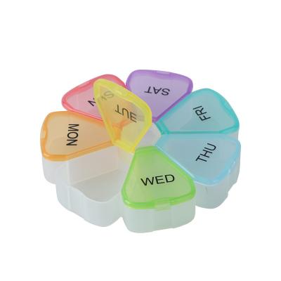 China Promotional Quality Transparent White PP Flower Design 7 Day Pill Box for sale