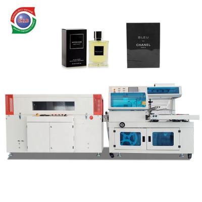 China Automatic Food PE POF Film Heat Shrink Wrapper Perfume Packing Machine for sale