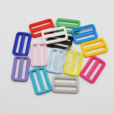 China Plastic Adjustable POM 38mm Tri Color Slip Slide Buckle for sale