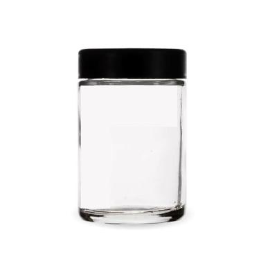 China Flower 3.5g 1000 MOQ Custom Design Round 1oz 2oz 3oz 4oz Straight Side Glass Food Jar With Child Resistant Lids Glass Jar Child Proof for sale