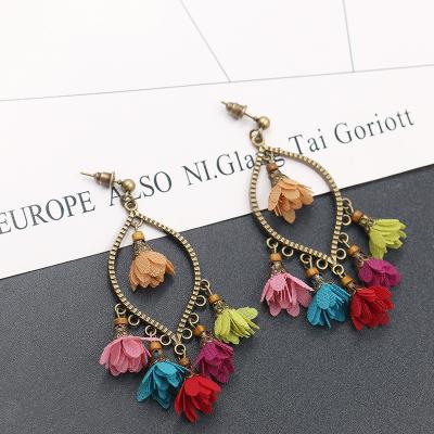 China BOHEMIA factory flower female European and American creative hot selling geometric chiffon tassel dangling earrings new for sale