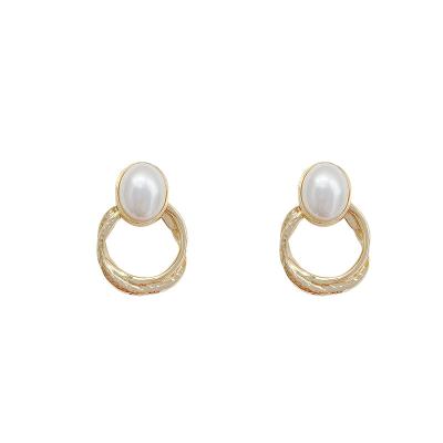 China BOHEMIA fashion personality geometric pearl earrings temperament pearl earrings cold wind design trend female net red ear jewelry for sale