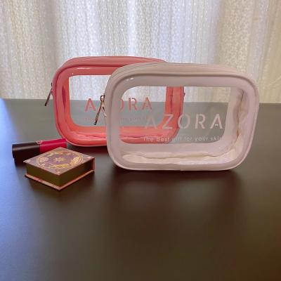 China Durable Colorful Waterproof Makeup Bags Waterproof Laser Zipper Laser PVC Cosmetic Bag With Custom Logo for sale