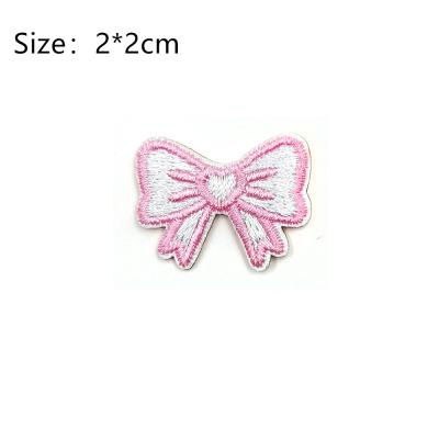 China New Style Bowknot Sustainable Embroidery Cloth Stickers Clothes Self Adhesive Computer Embroidery Label Stickers for sale