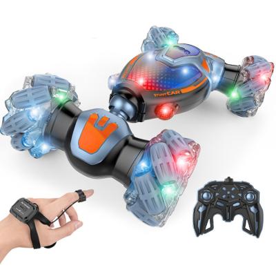 China Hot Selling Obstacle Avoidance Rotation 2.4G 360 Hand Gesture Feeling Twisting RC Drift Car Climbing Remote Control Car For Kids Adults for sale