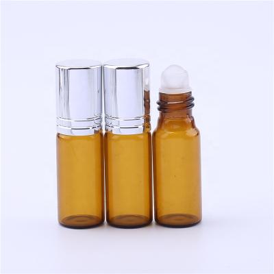 China Essential Amber Personal Care Oil Use 5ml Roll On Perfume Glass Bottle With Glass Roller for sale